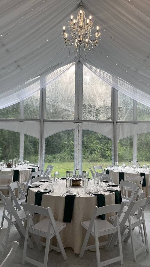Intimate outdoor ceremony with guests seated among natural greenery at a Southern Ontario estate